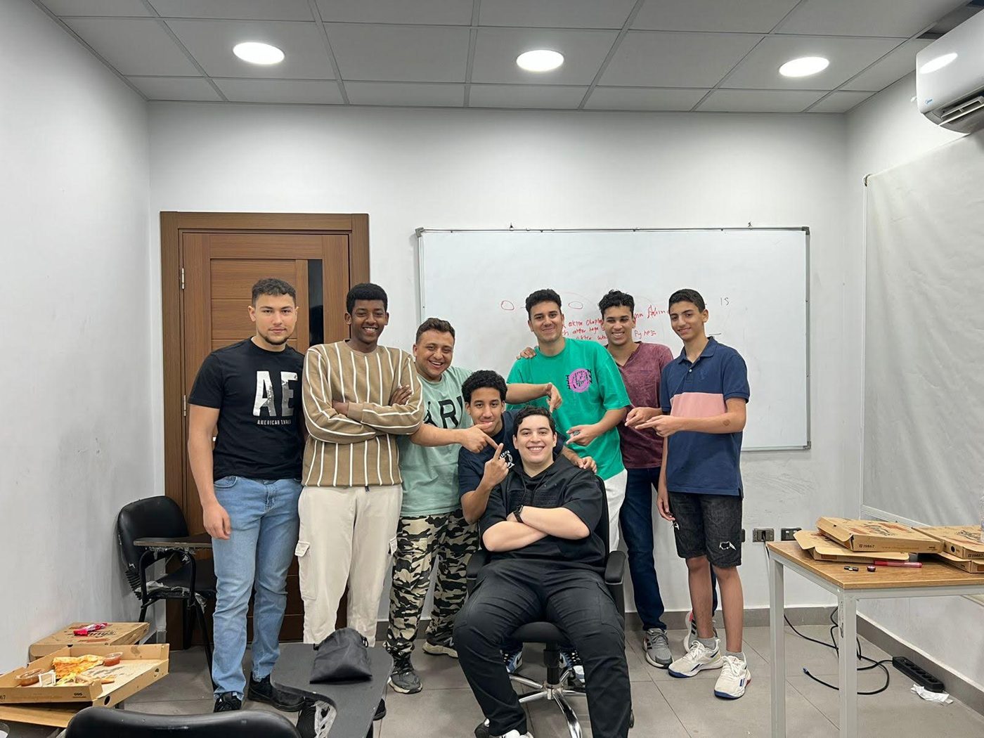 Shefo Squad students with IGCSE physics teacher Ahmed Sherif